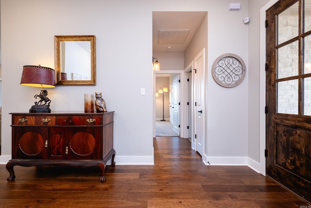 foyer featuring dark wood-type flooring