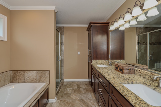 bathroom with crown molding, vanity, and shower with separate bathtub