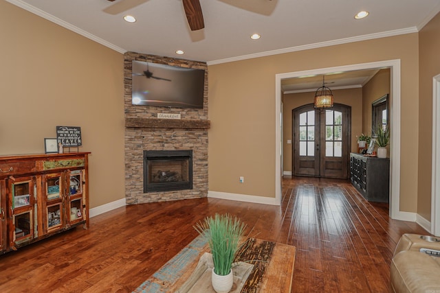 unfurnished living room featuring ornamental molding, french doors, and wood-type flooring