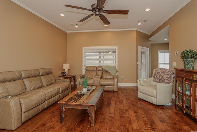 living room featuring ornamental molding, dark wood-type flooring, and ceiling fan