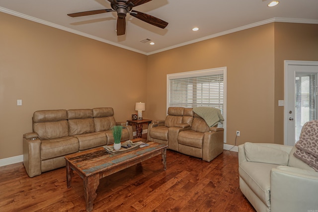 living room with wood-type flooring, ceiling fan, a wealth of natural light, and crown molding