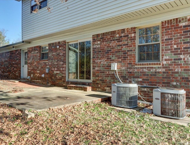 exterior space with a patio and central AC unit