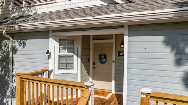 entrance to property featuring a deck