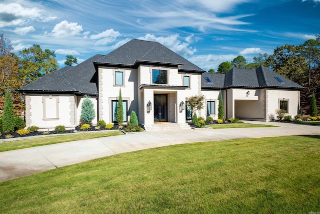 view of front of home with a front yard