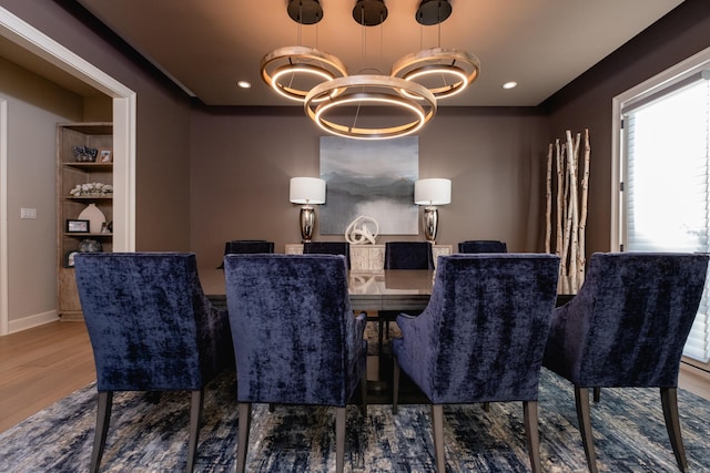 dining room with hardwood / wood-style flooring