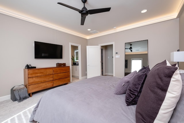 carpeted bedroom with ceiling fan and crown molding