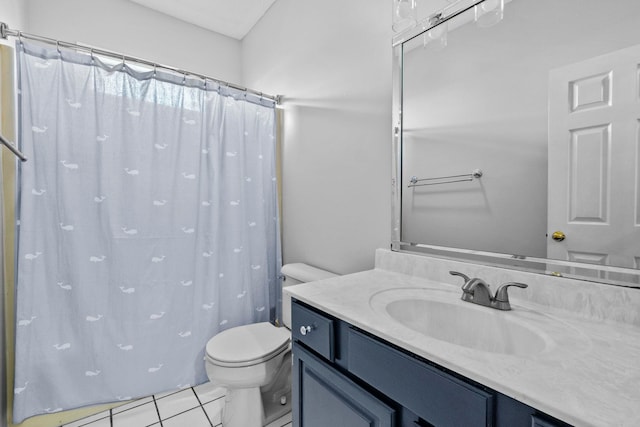 bathroom featuring vanity, a shower with shower curtain, and toilet