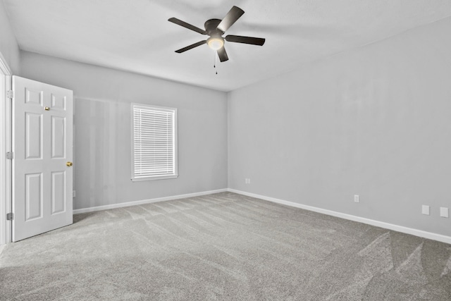 unfurnished room with light carpet and ceiling fan