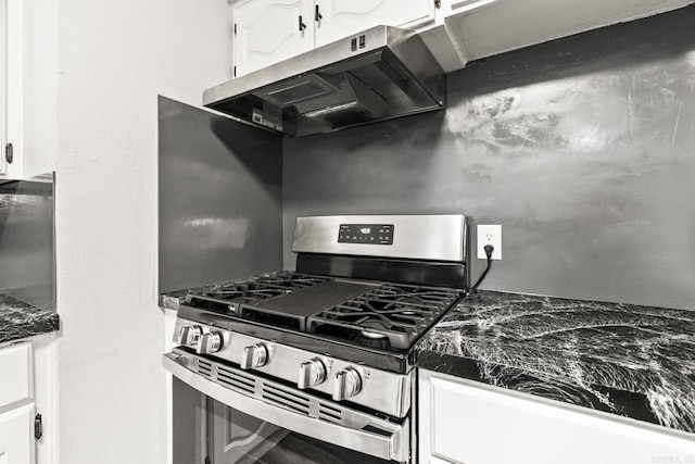 kitchen with white cabinets and gas range