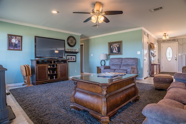 living room featuring ornamental molding and ceiling fan