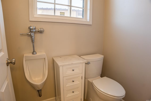 bathroom featuring toilet