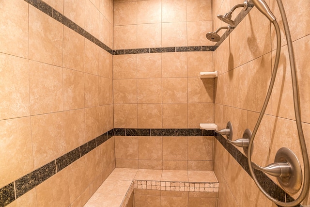room details with a tile shower