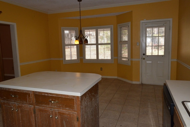 kitchen featuring hanging light fixtures, a center island, light tile patterned floors, an inviting chandelier, and crown molding