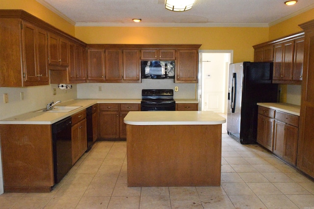 kitchen featuring black appliances, a center island, ornamental molding, and sink