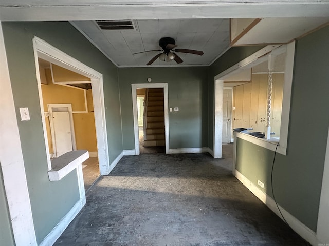 interior space featuring ceiling fan