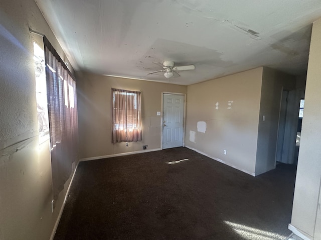 unfurnished room featuring ceiling fan