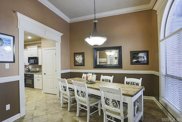 tiled dining room with crown molding