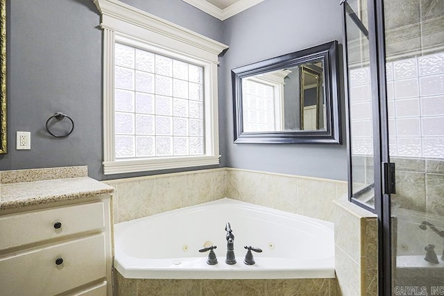 bathroom featuring shower with separate bathtub, crown molding, and vanity