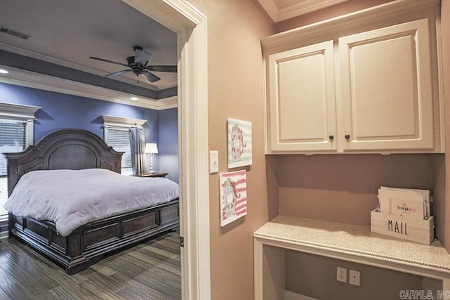 bedroom with ornamental molding, ceiling fan, and dark hardwood / wood-style floors