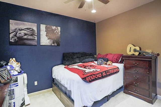 bedroom featuring ceiling fan and light colored carpet