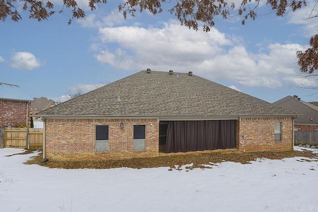 view of snow covered property