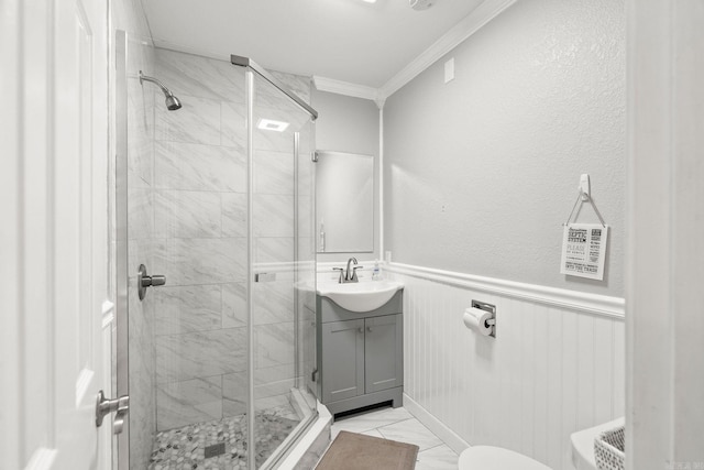 bathroom with toilet, an enclosed shower, vanity, and crown molding