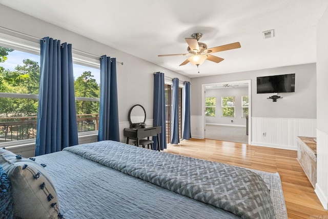 bedroom featuring hardwood / wood-style flooring and ceiling fan