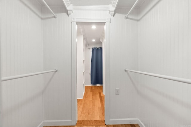 walk in closet featuring hardwood / wood-style flooring