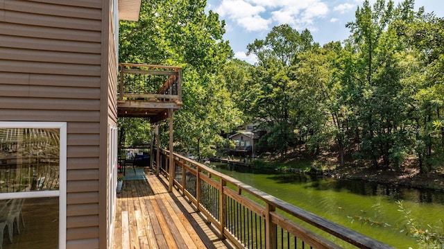 deck featuring a water view