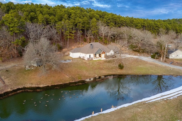 drone / aerial view with a water view