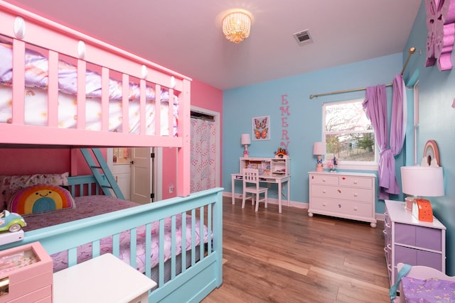 bedroom with wood-type flooring