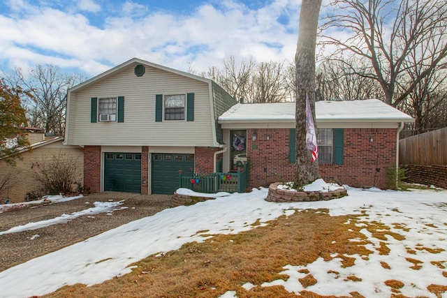 split level home featuring a garage