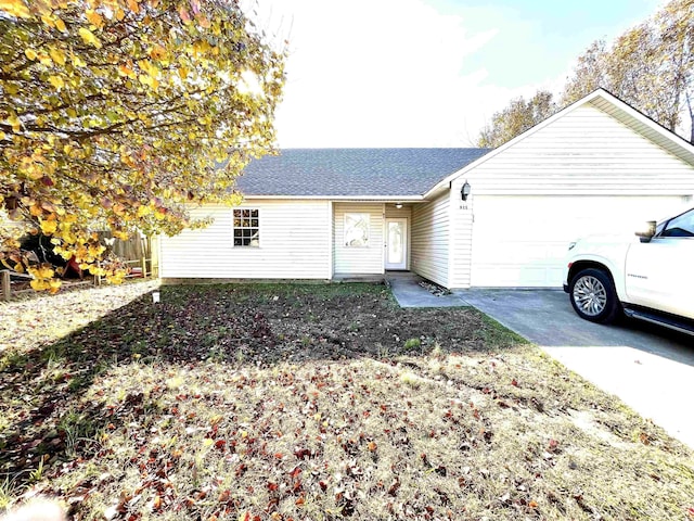 single story home featuring a garage