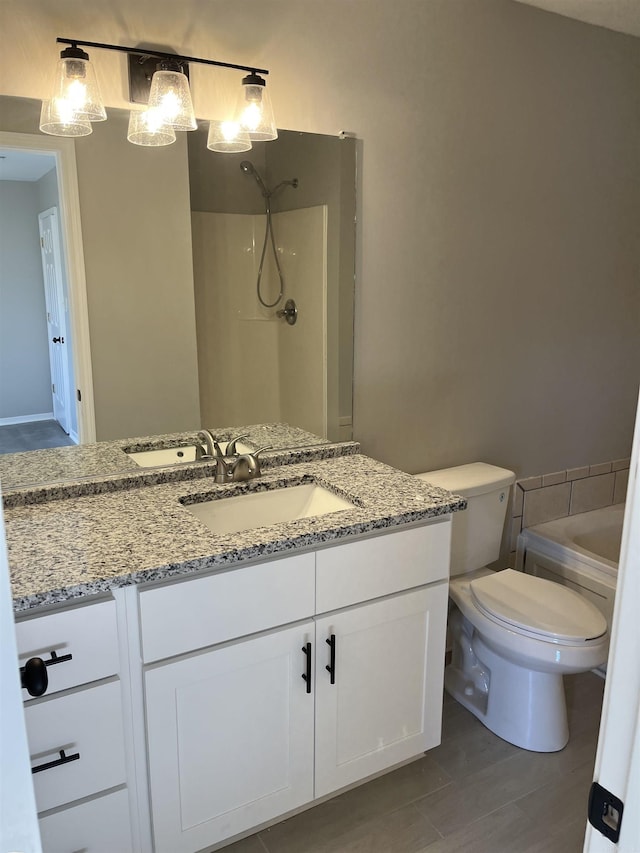 full bathroom featuring plus walk in shower, vanity, and toilet