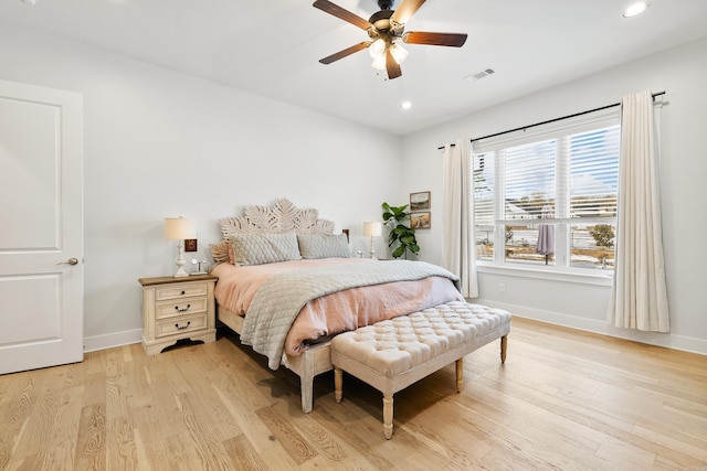 bedroom featuring ceiling fan and light hardwood / wood-style flooring