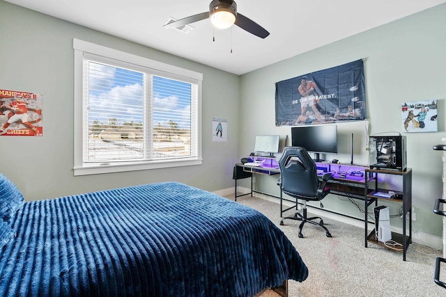 bedroom featuring ceiling fan and carpet flooring