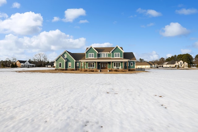 view of snow covered property