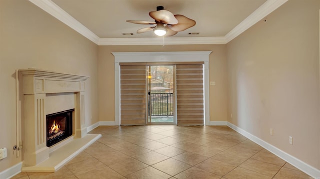 unfurnished living room with light tile patterned floors, ceiling fan, and crown molding