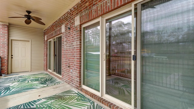 exterior space with ceiling fan