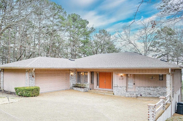 single story home featuring a garage