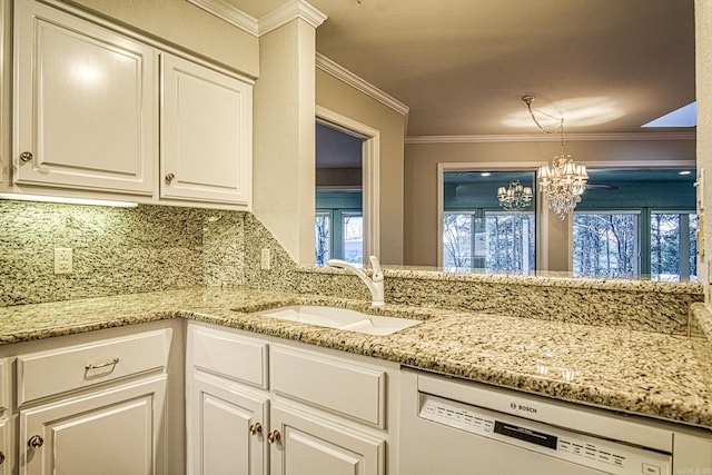 kitchen featuring tasteful backsplash, crown molding, white cabinetry, white dishwasher, and sink