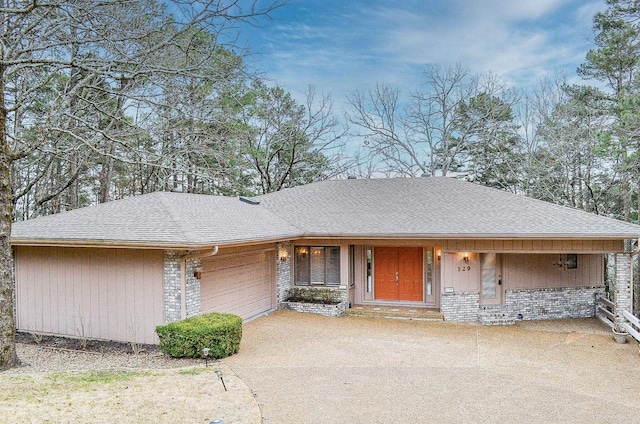 single story home with a garage