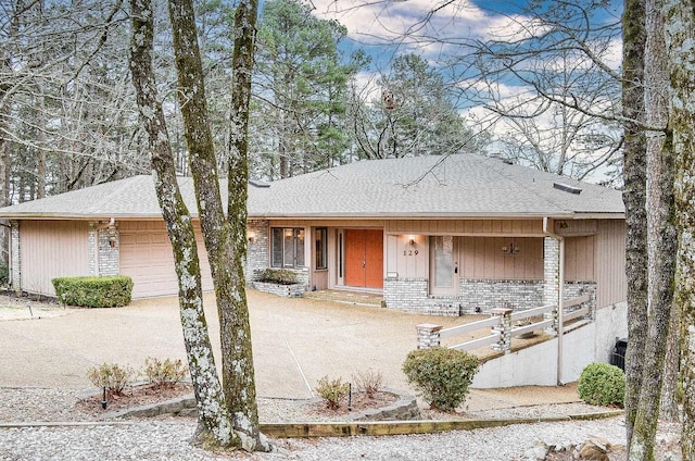 ranch-style home with a garage