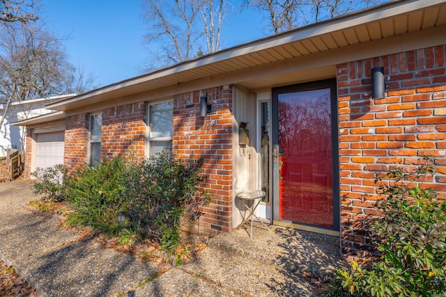 entrance to property with a garage