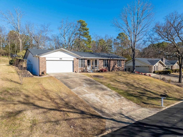 ranch-style home with a front yard and a garage