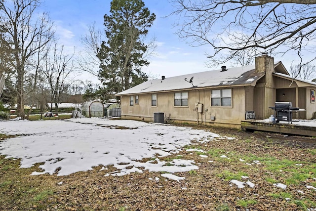 view of snow covered property