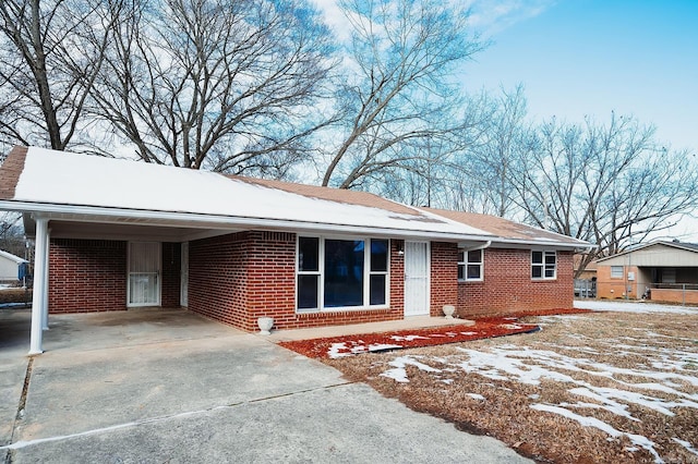 single story home with a carport