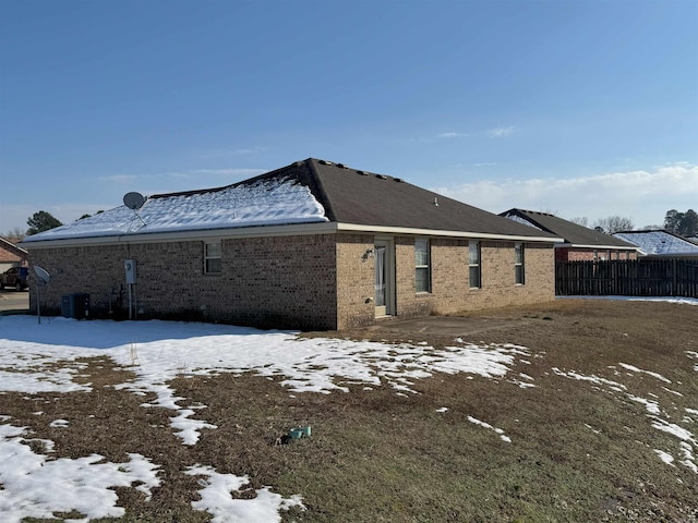 view of snow covered property