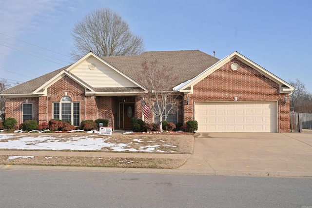 view of front of property featuring a garage