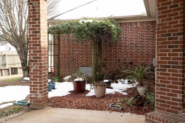 view of snow covered patio